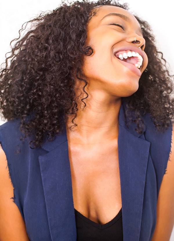 woman with piercing laughs