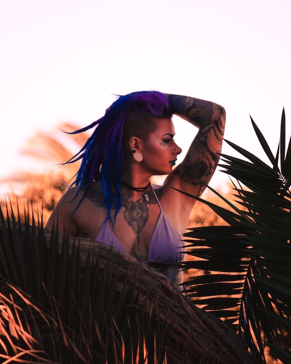 woman with tattoos and piercings