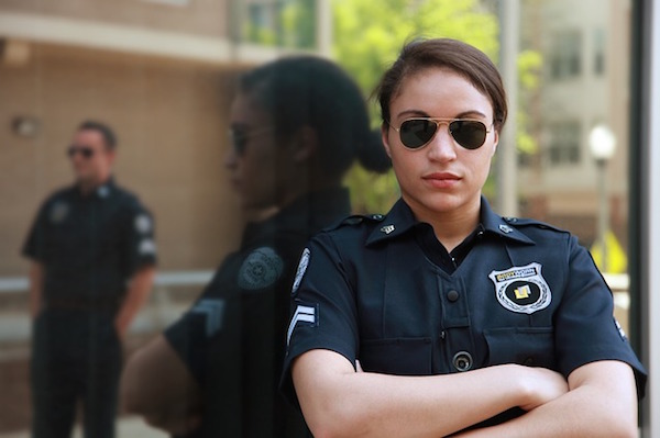 female security guard poses for photo