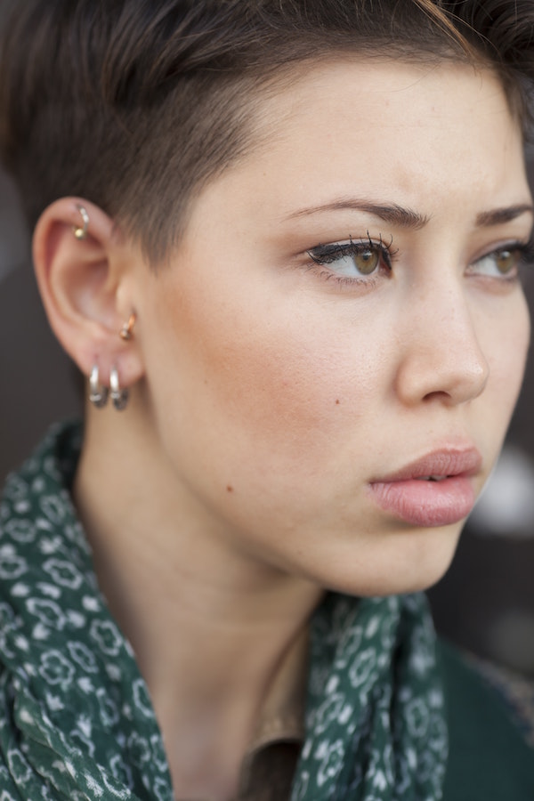 woman with cartilage piercings